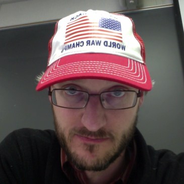 A bearded me wearing a trucker hat - there's a word-picture for you...