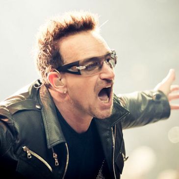 Bono performing in 2011