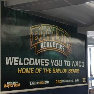 "Baylor Athletics Welcomes You to Waco" (sign in Waco Airport)
