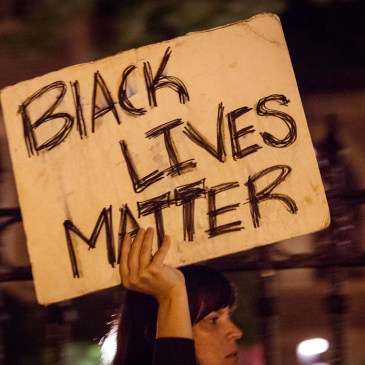 "Black lives matter" sign at Philando Castile protest in St. Paul, MN