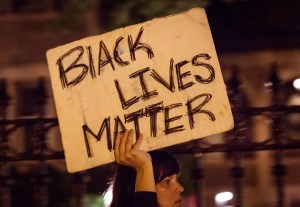 "Black lives matter" sign at Philando Castile protest in St. Paul, MN