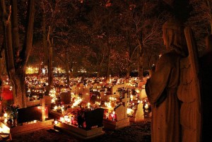Polish graves lit with candles for All Saints' Day