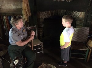 Isaiah with a Park Ranger at Mabry Mill