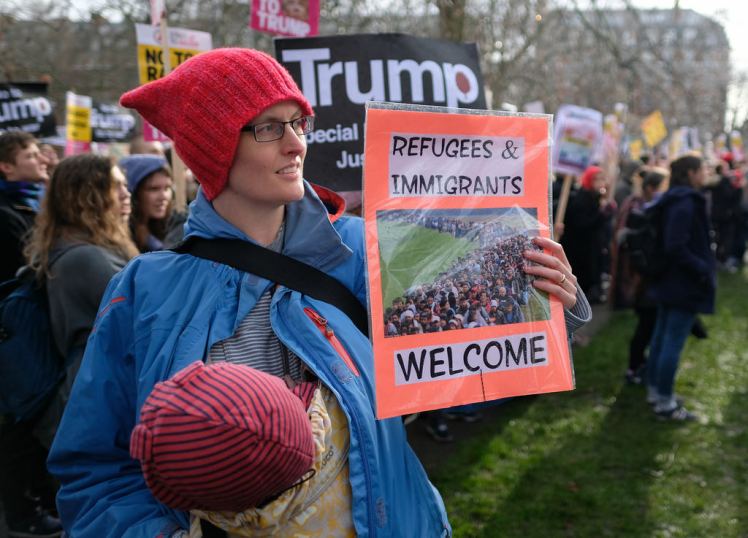British protest against Trump refugee order: "Refugees & immigrants welcome"