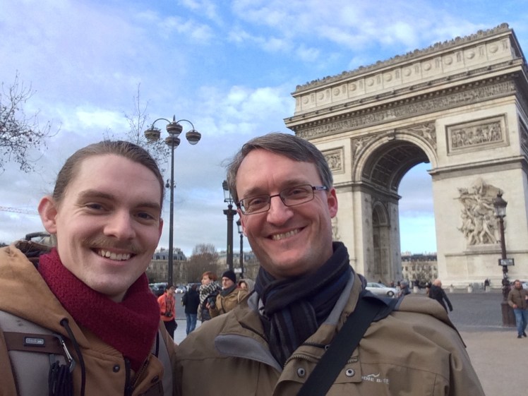 Connor Larson and me in front of the Arc de Triomphe