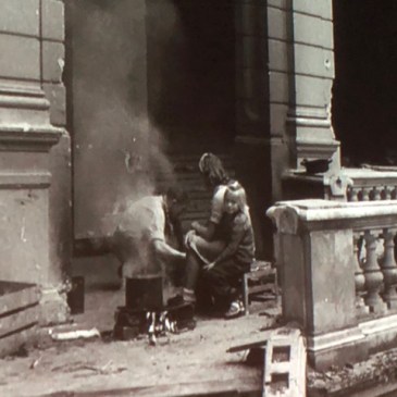 Still photo from the 1946 documentary, "A Defeated People": children in the ruins of a German building