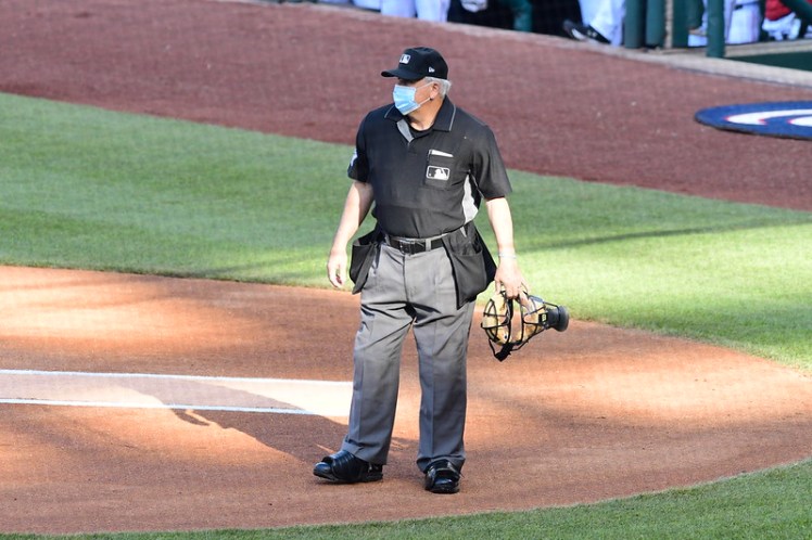 Umpire wearing a COVID mask