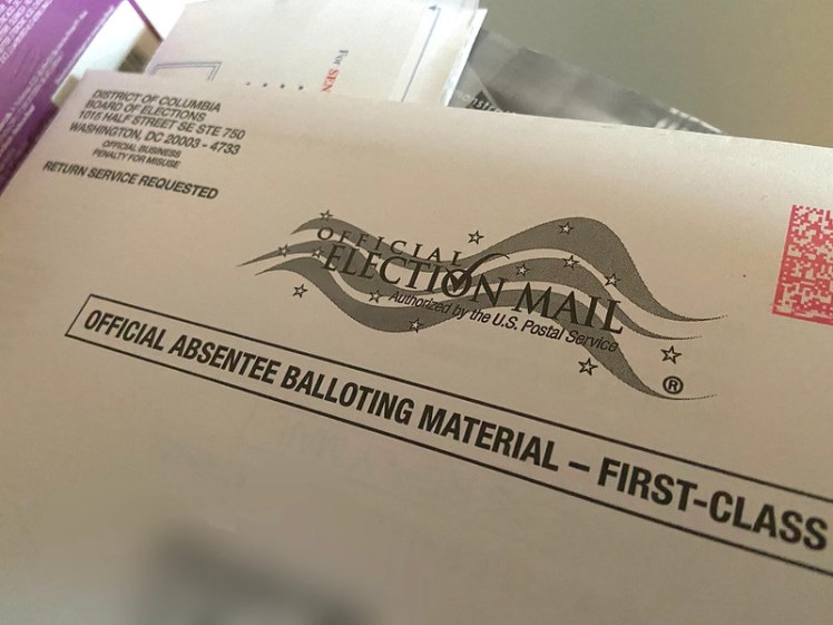 Absentee ballot in envelope